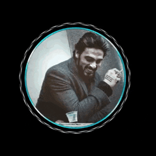 a man in a suit is smoking a cigarette in a circle