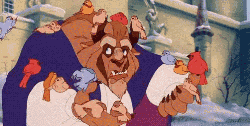 the beast from beauty and the beast is surrounded by birds on his chest .