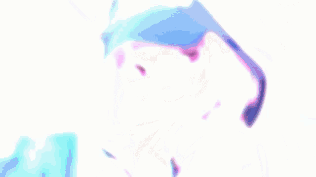 a girl with pink hair is wearing a blue hat