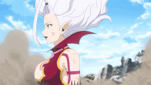 a woman with white hair and a red collar is standing in the dirt