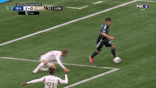 a soccer game between sea and lafc is being played on fox
