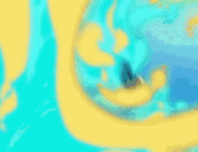a close up of a yellow and blue background with a cross in the middle