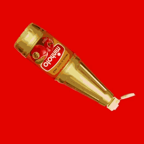 a 750ml bottle of minhojo apple cider vinegar with a red background