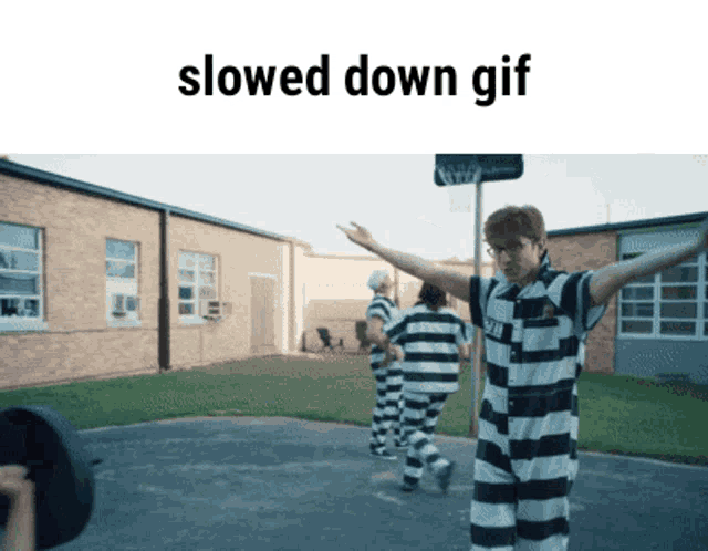a slowed down gif of a man in a striped jumpsuit