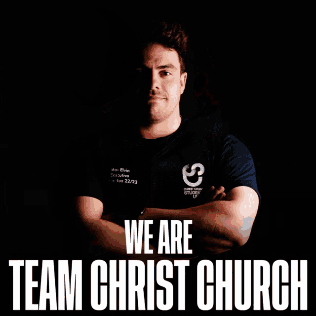 a man wearing a basketball jersey with the words we are team christ church on it
