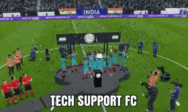 a group of soccer players celebrate on a podium with the words tech support fc below them
