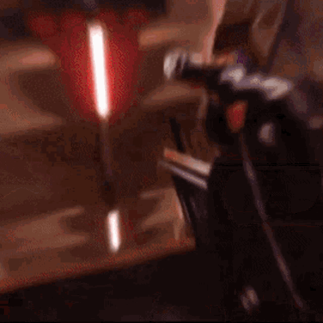 a person holding a can of soda on a set of escalators