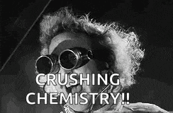 a black and white photo of a man wearing goggles and the words `` crushing chemistry ! ''