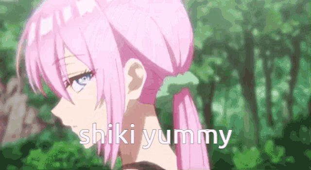 a close up of a pink haired anime girl with the words `` shiki yummy '' written on it .