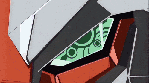 a close up of a robot 's head with a green screen