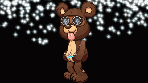 a brown teddy bear wearing goggles and a necklace with the word yuki written on it