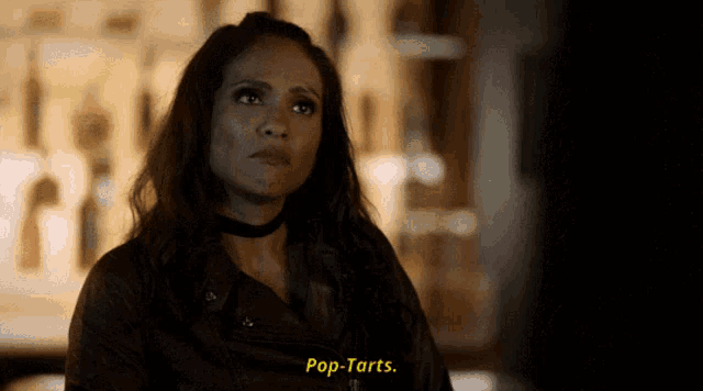 a woman wearing a choker says pop-tarts
