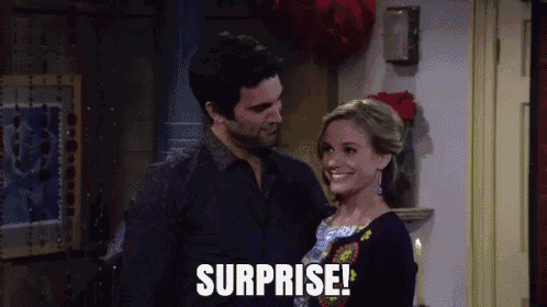 a man and woman are standing next to each other and the man is saying surprise .