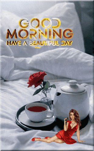 a woman in a red dress is laying on a bed next to a cup of tea and a teapot