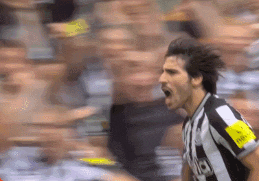 a soccer player wearing a jersey that says juventus on the sleeve