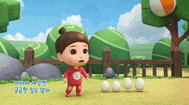 a little girl in a red shirt with an owl on it is standing next to three white eggs