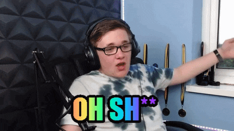 a young man wearing headphones and glasses says oh sh
