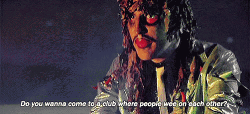 a man is talking about a club where people wee on each other .