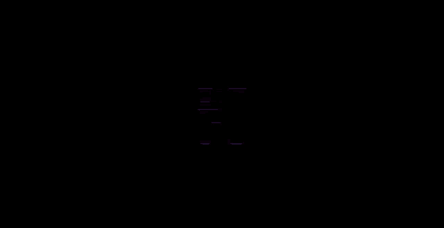 a neon letter k is glowing in the dark .