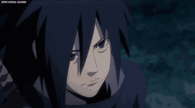 a close up of a naruto character with a scarf around his neck and a serious look on his face .