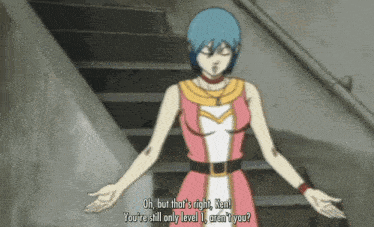 a woman in a pink dress is standing on a set of stairs talking to ken