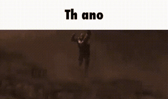 a silhouette of a person standing in front of a fire with the words `` th ano '' written on it .