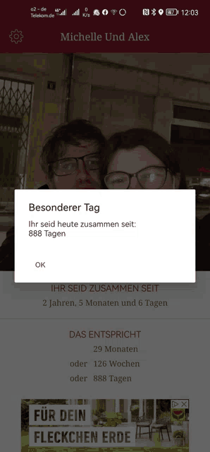 a phone screen shows a man and a woman and a popup that says besonderer tag