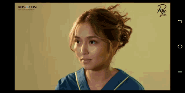 a screen shot of an abs cbn entertainment showing a woman