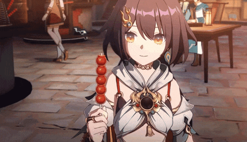 a girl with a necklace around her neck is holding a stick of food