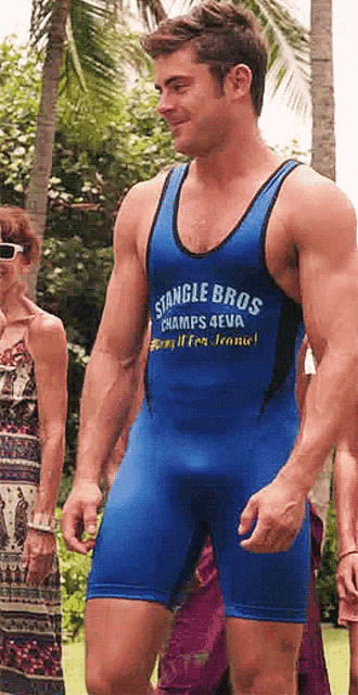 a man in a blue singlet that says stongle bros on it