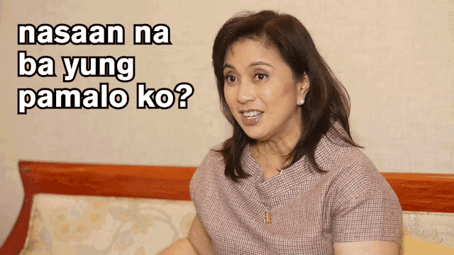a woman sitting on a couch with the words nasaan na ba yung pamalo ko written above her