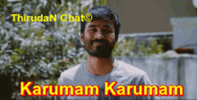 a man with a beard stands in front of a sign that says thiruda chat