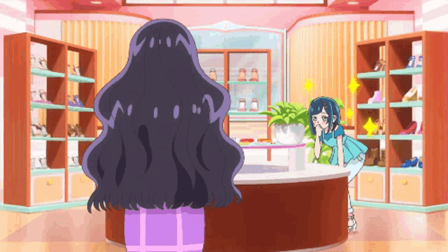a girl with long black hair is standing in a room with shelves of shoes