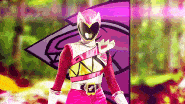 a pink power ranger is standing in front of a purple arrow .