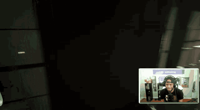 a man playing a video game with a close button in the corner