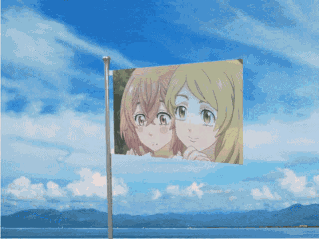 a flag with a picture of two girls on it is flying in the wind