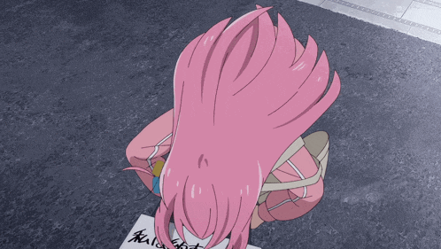 a girl with pink hair is holding a piece of paper with chinese writing