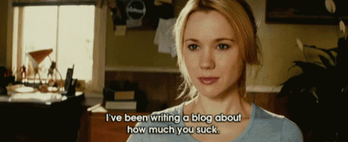 a woman is talking about writing a blog about how much she sucks