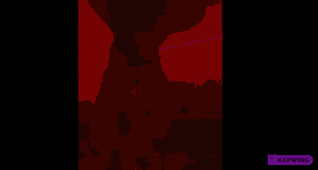 a person is standing in front of a purple light .