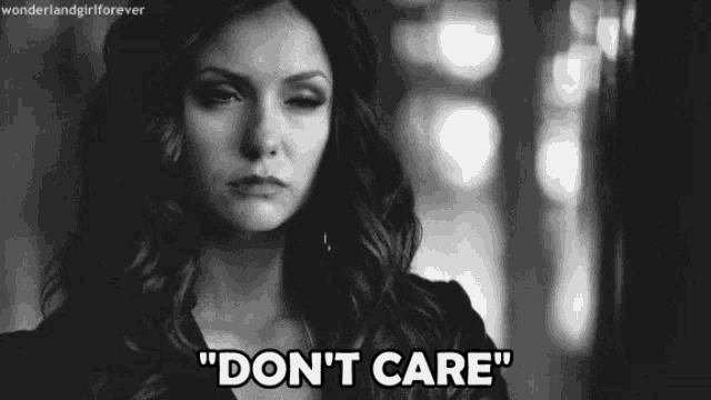 a black and white photo of a woman with the words " don 't care " below her