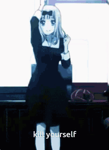 a girl in a black dress is dancing with the words kill yourself written on the bottom