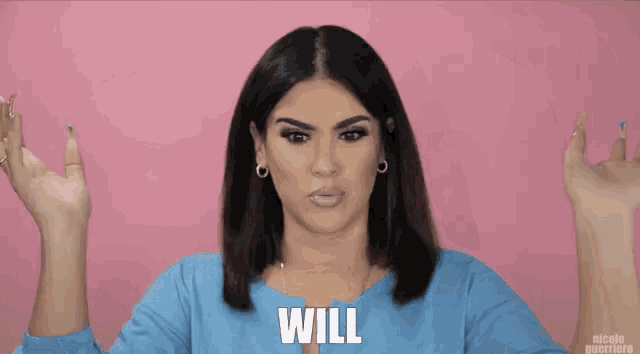 a woman with long nails is making a funny face and says will