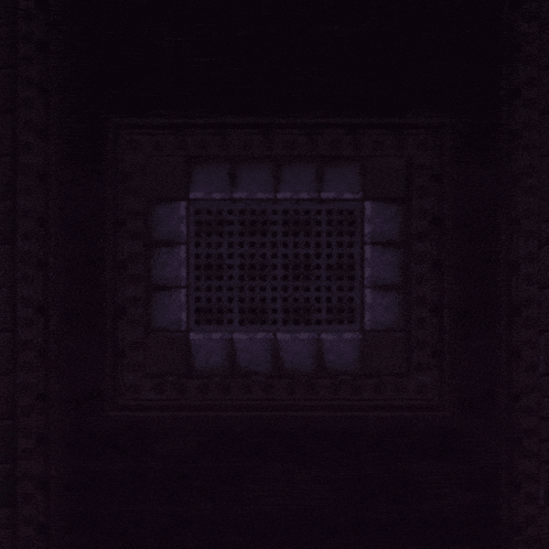 a pixel art drawing of a red circle with a black square in the middle