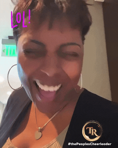 a woman with her tongue out and a lol sticker on her face