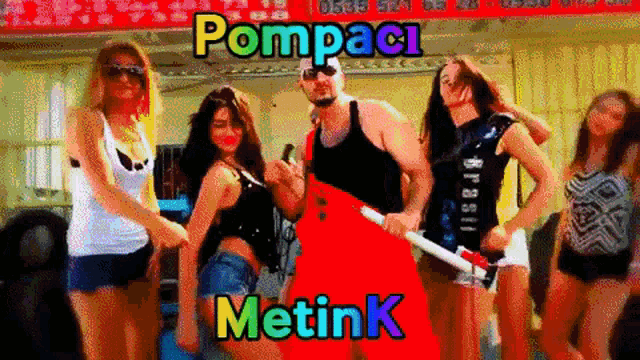 a group of women and a man are dancing with the words pompaci metink written above them