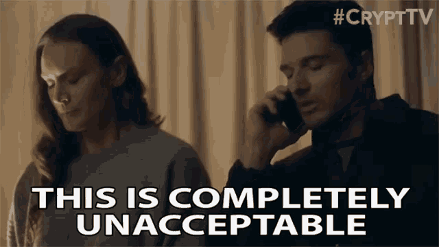 a man is talking on a cell phone next to a woman who says this is completely unacceptable
