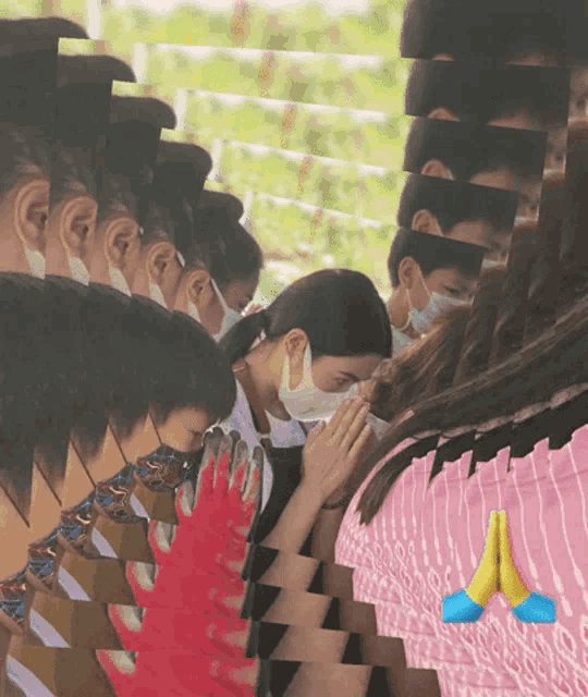 a group of people wearing face masks are praying in a collage
