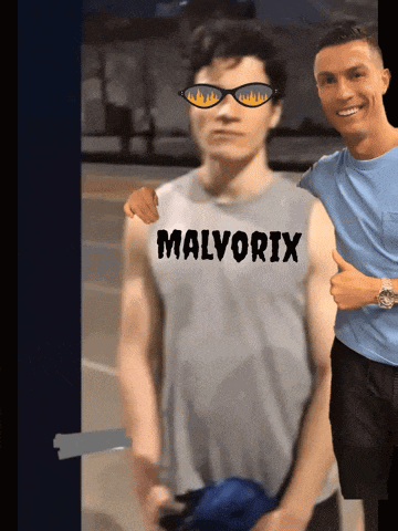 a man wearing a shirt that says malvorix stands next to another man