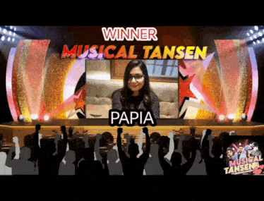 a winner of musical tansen is being recognized on stage