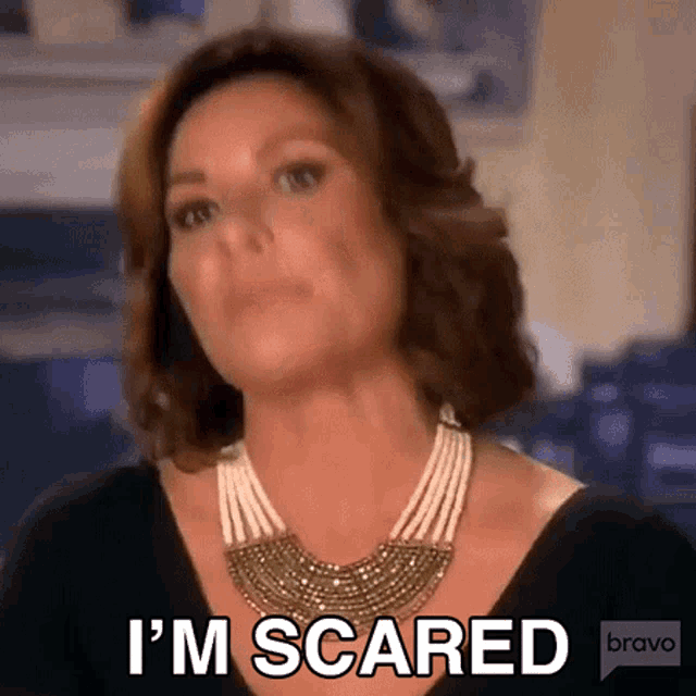 a woman wearing a necklace is saying i 'm scared on bravo .